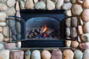 gas fireplace with stone surround
