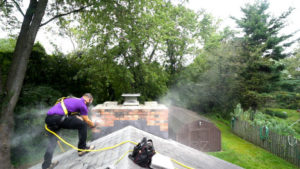 man performing chimney repair 