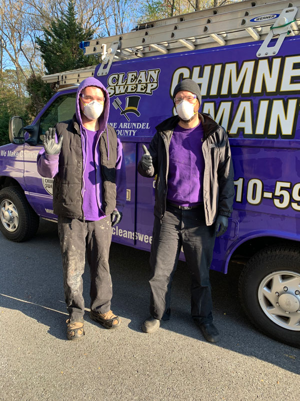 chimney sweeps with safety gear during covid 19