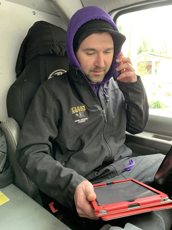 chimney technician reviewing report